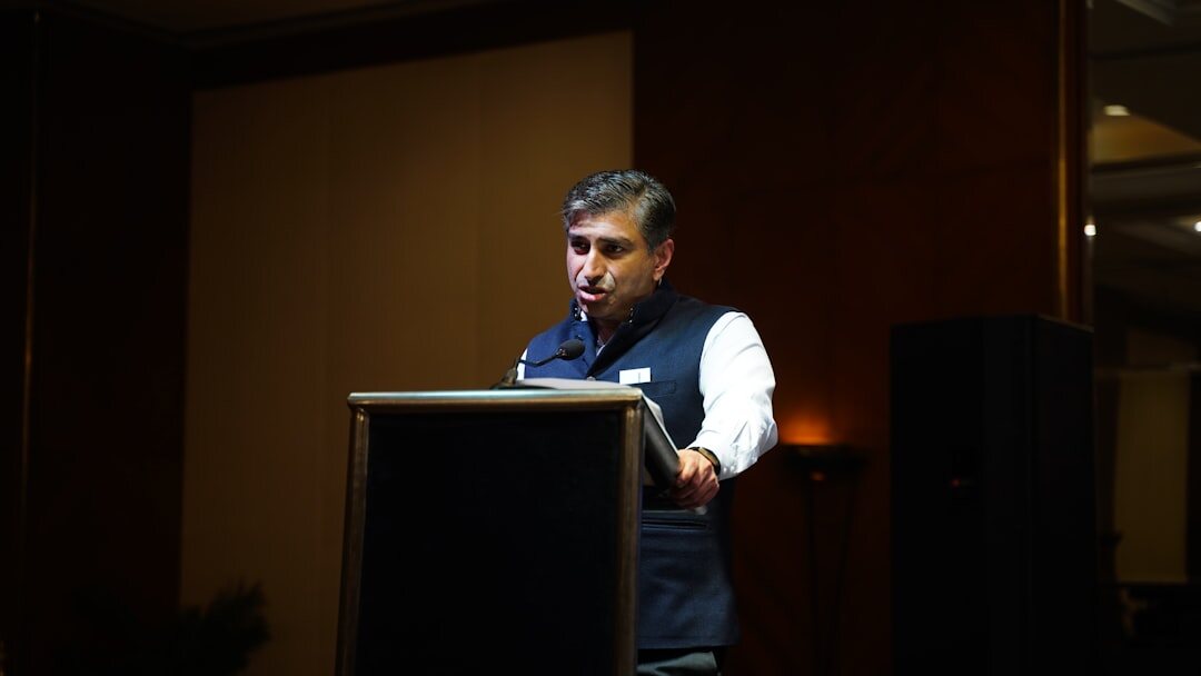 confident speaker on stage